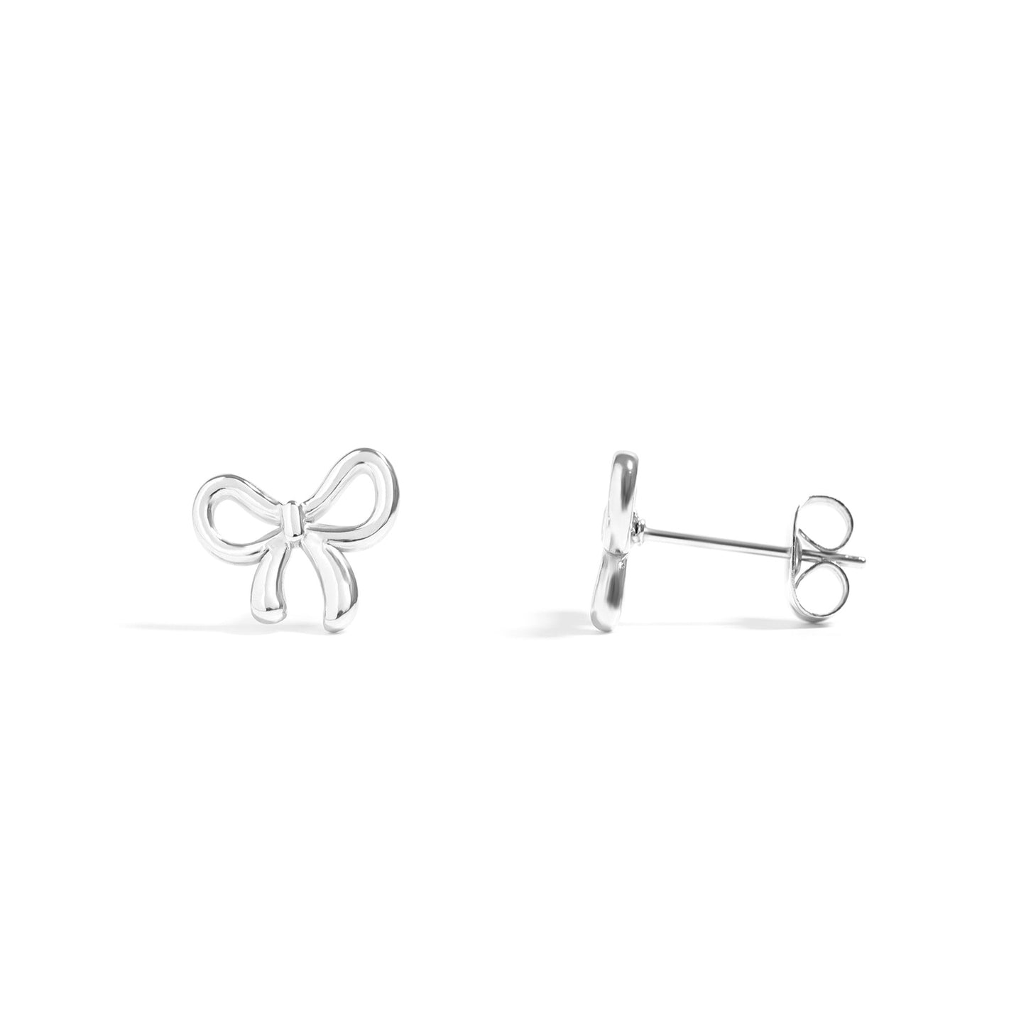 Silver bow-shaped earrings on a white background