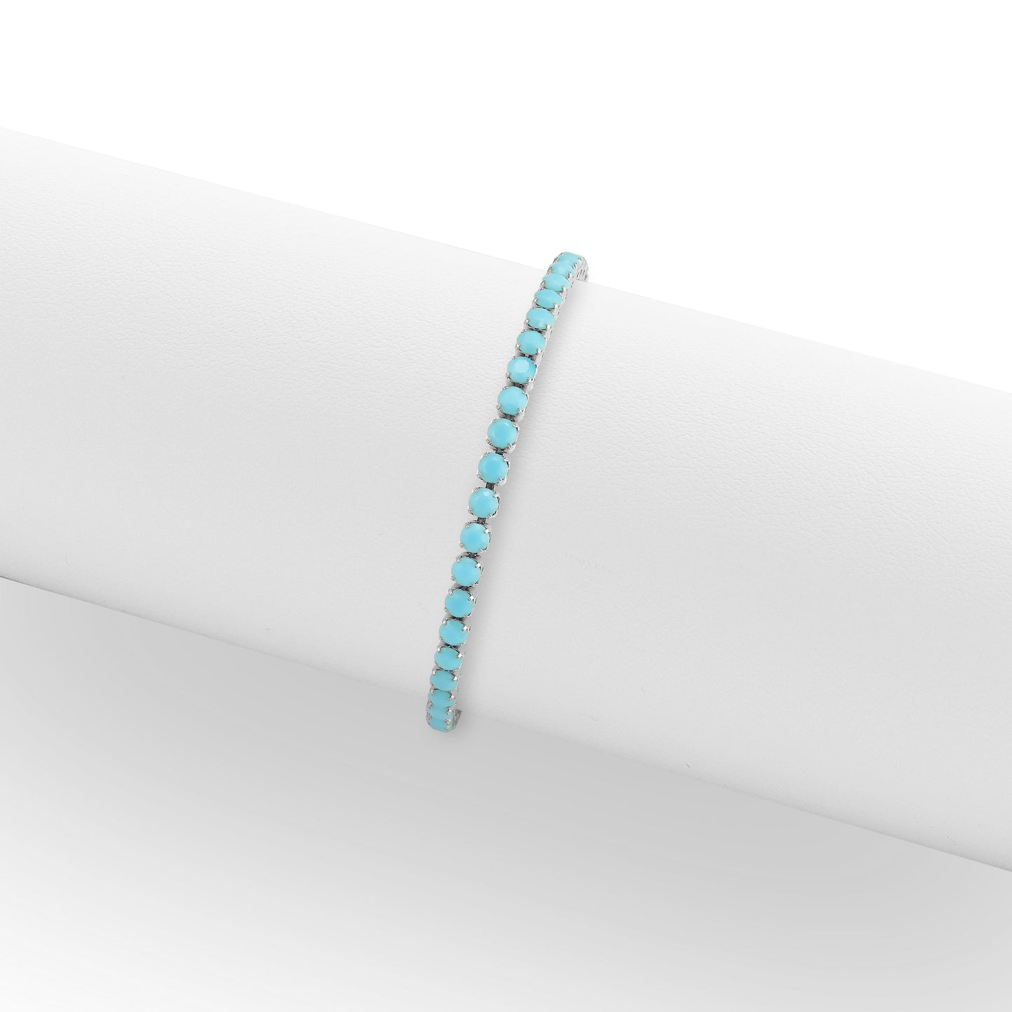 Turquoise rhinestone bracelet on a white background