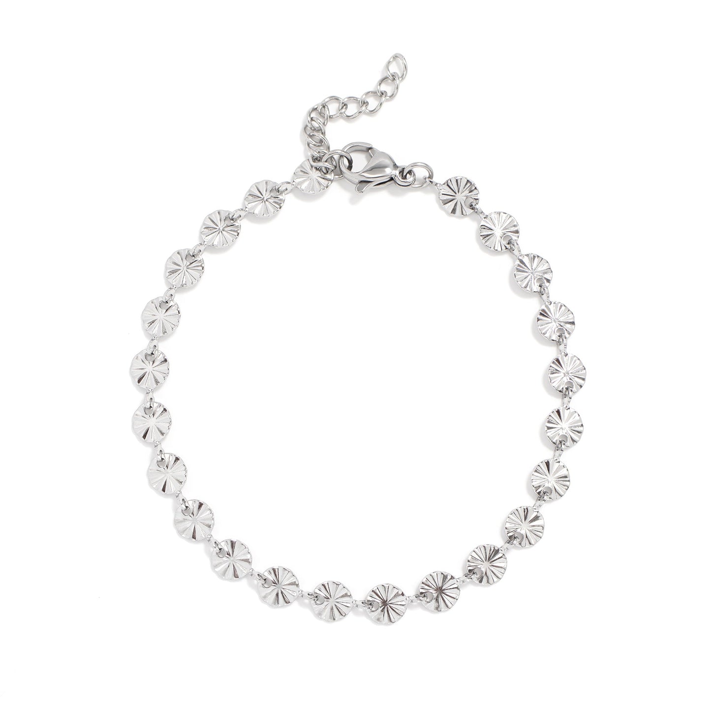 Silver bracelet with sun shapes on a white background