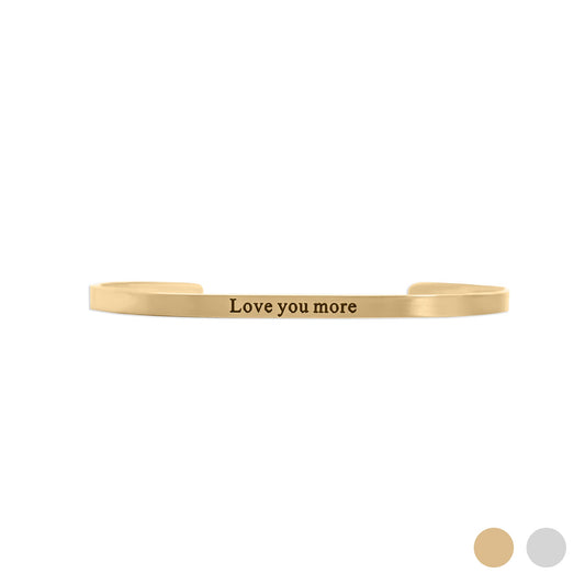 Gold bracelet with 'Love you more' engraving on a white background