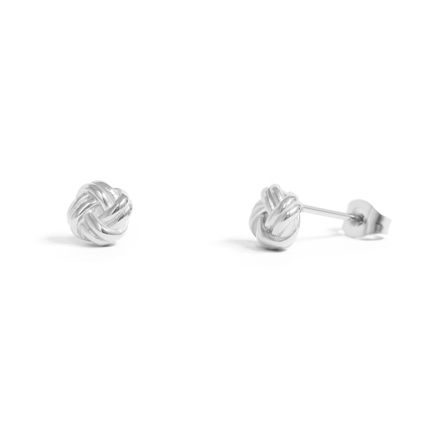 Silver knot earrings on a white background
