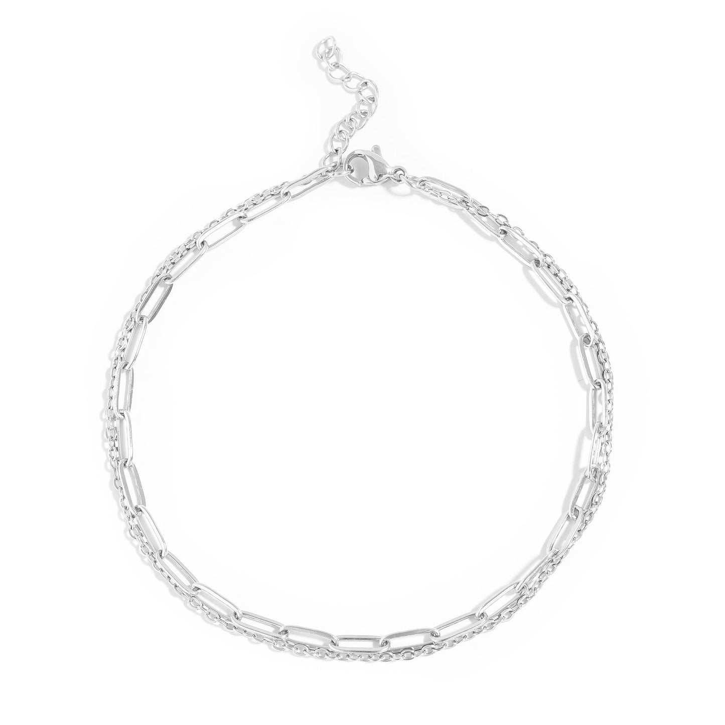 Silver layered paperclip chain anklet on a white background