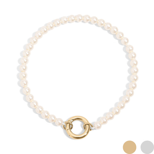 Pearl bracelet with a gold clasp on a white background