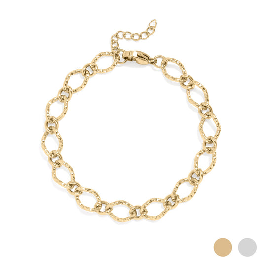 Gold hammered oval chain bracelet on a white background