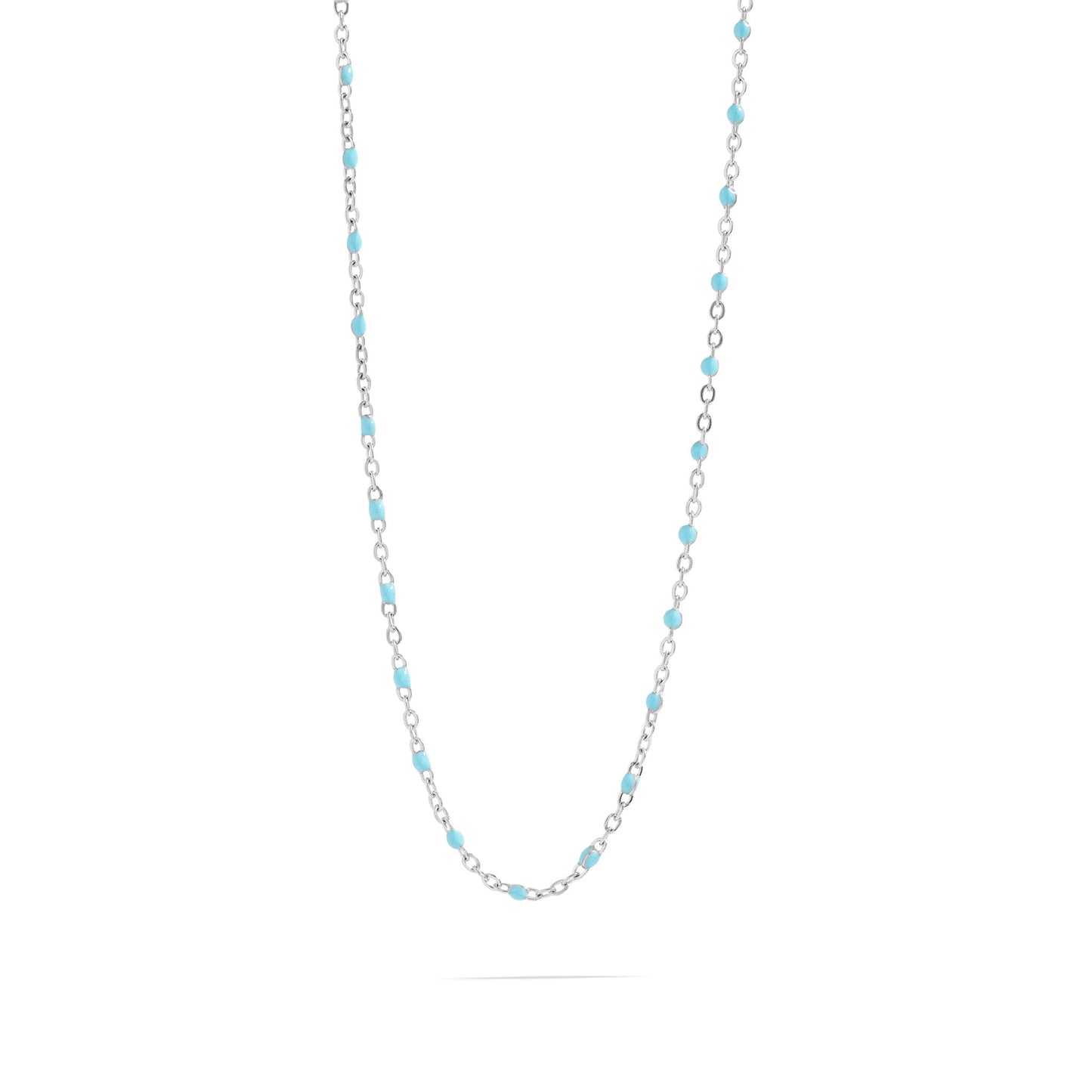 Necklace with alternating silver and turquoise beads on a white background