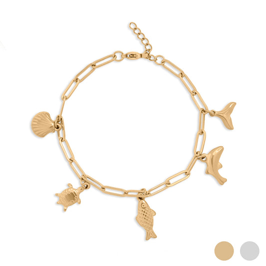 Gold bracelet with various sea creature charms on a white background