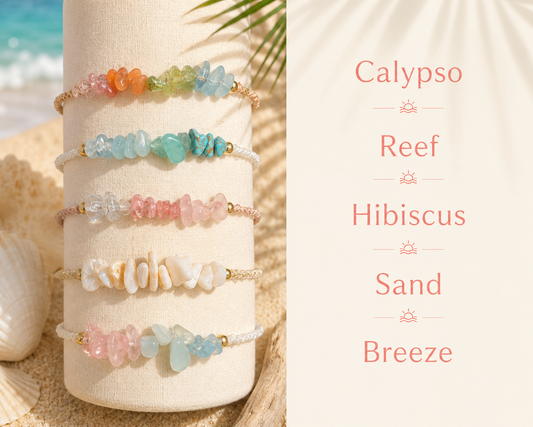 Five colorful beaded stretch bracelets displayed on a cream fabric stand, set against a beach-themed background with sand, seashell, palm leaves, and ocean. The right side features a cream panel with text listing the bracelet names: Calypso, Reef, Hibiscus, Sand, and Breeze.