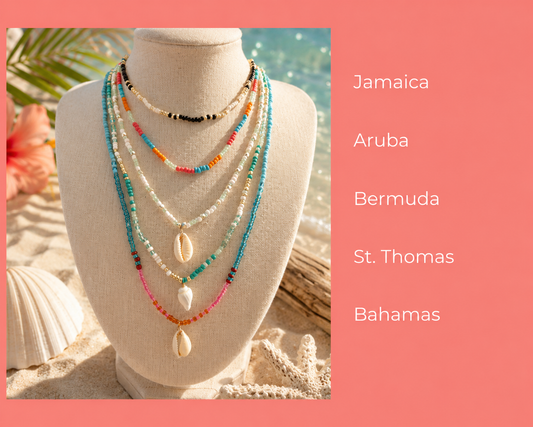 A set of five layered beaded necklaces displayed on a beige fabric mannequin bust, styled with a tropical beach theme. The necklaces feature various colorful bead strands and shell details.