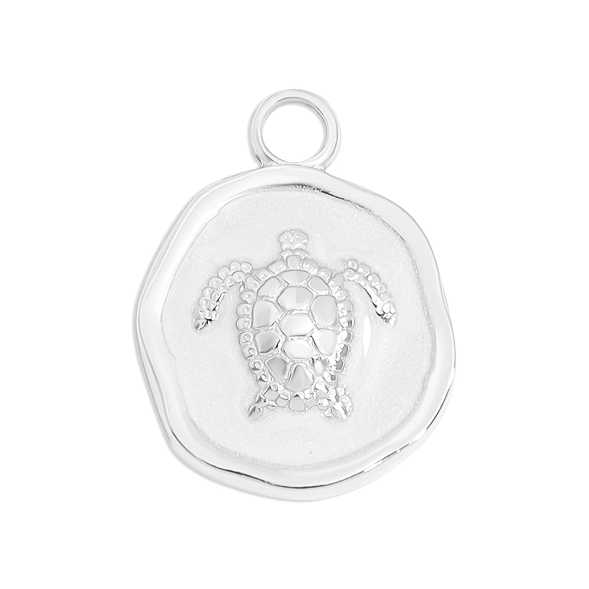 Silver circular pendant with a sea turtle in the center on a white background
