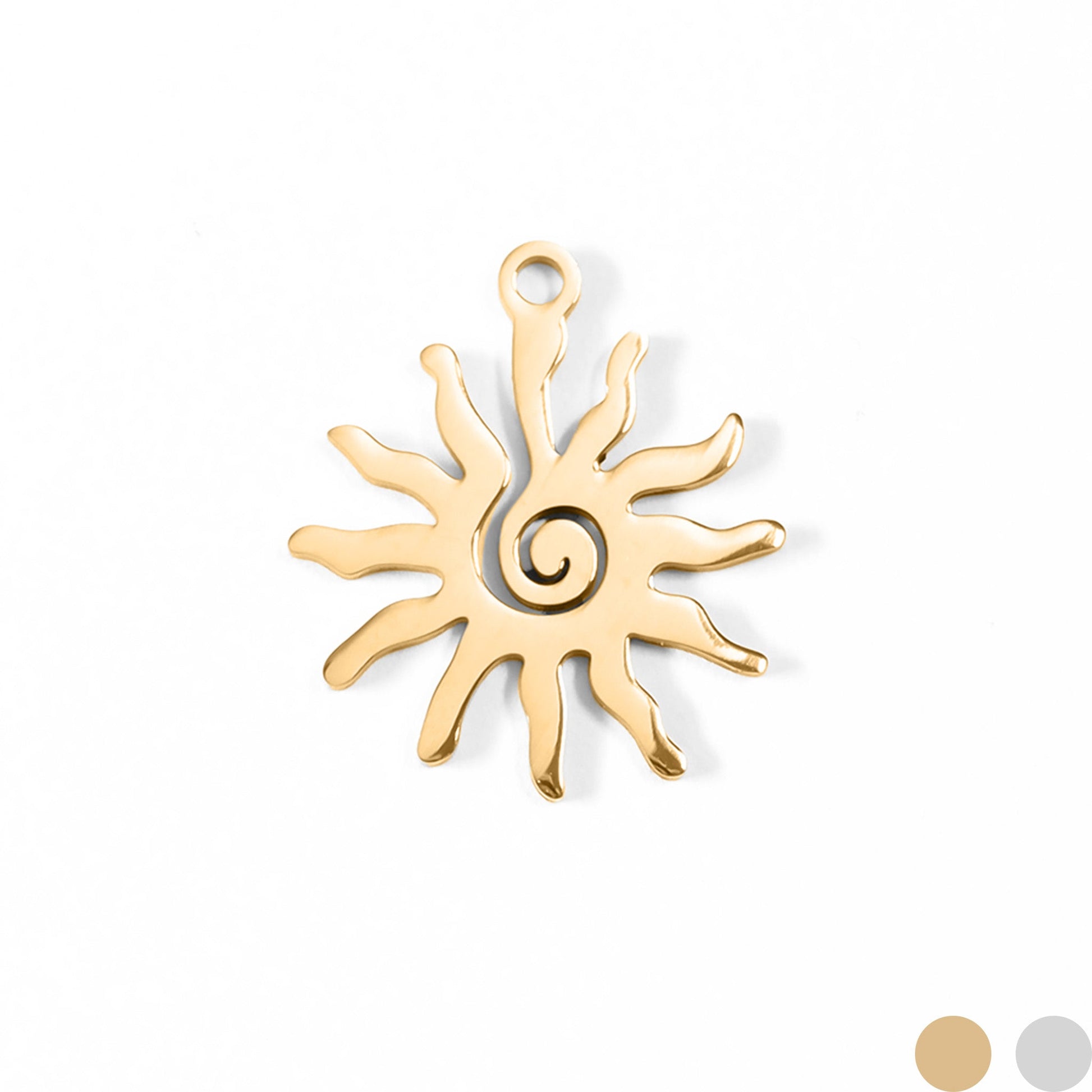 Gold sun-shaped pendant on a white background